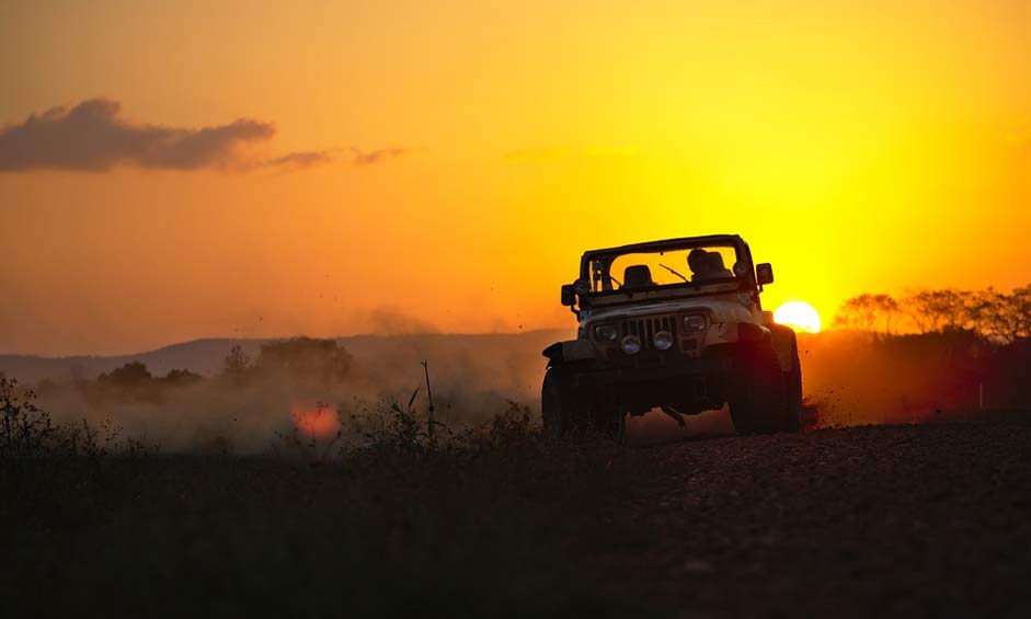 Sunset Dust Drifting Jeep