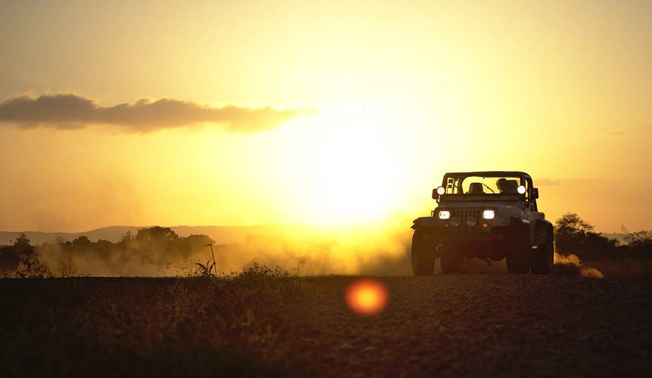 Sunset Dust Drifting Jeep