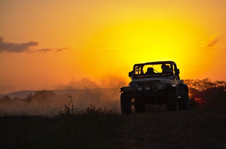 Sunset Dust Drifting Jeep