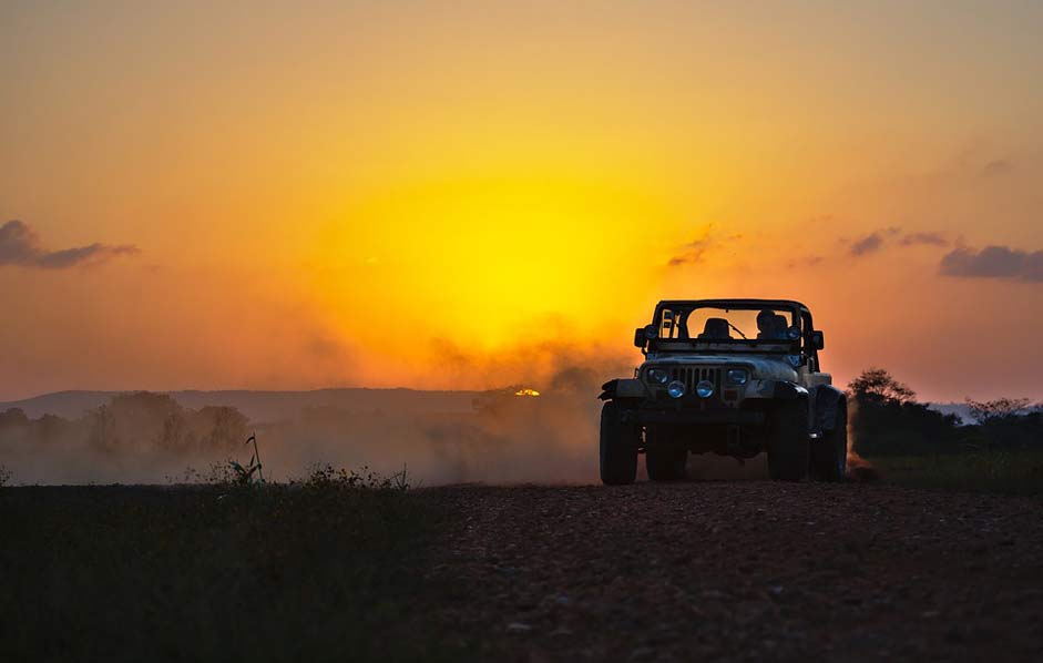 Sunset Dust Drifting Jeep