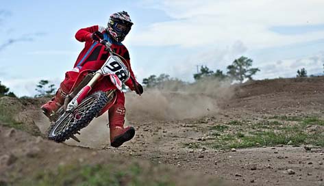 Speed-Curve Dirt-Bike Rider Motocross Picture
