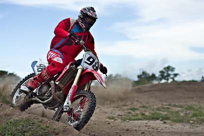 Speed-Curve Dirt-Bike Rider Motocross Picture