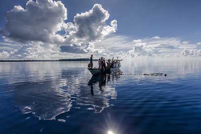 Reflection-Of-The-Surface-Of-The-Water  Boat Landscape Picture